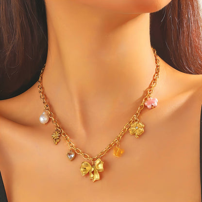 Golden Charm Bow Necklace — 18K Gold-Tone Symbolic Pendant
