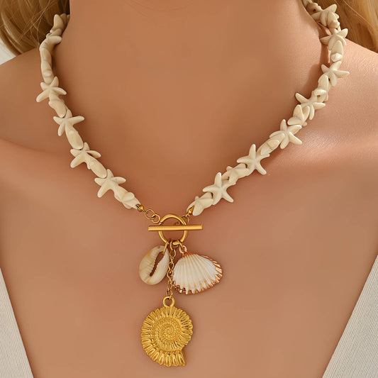Ocean Whisper Seashell & Starfish Necklace – Gold-Tone Coastal Elegance