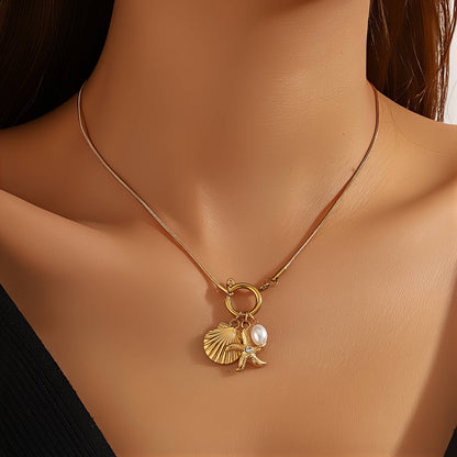 Ocean Whisper Starfish & Seashell Necklace — Gold-Tone Coastal Charm Pendant