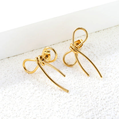 Boucles d'oreilles pendentif nœud sucré