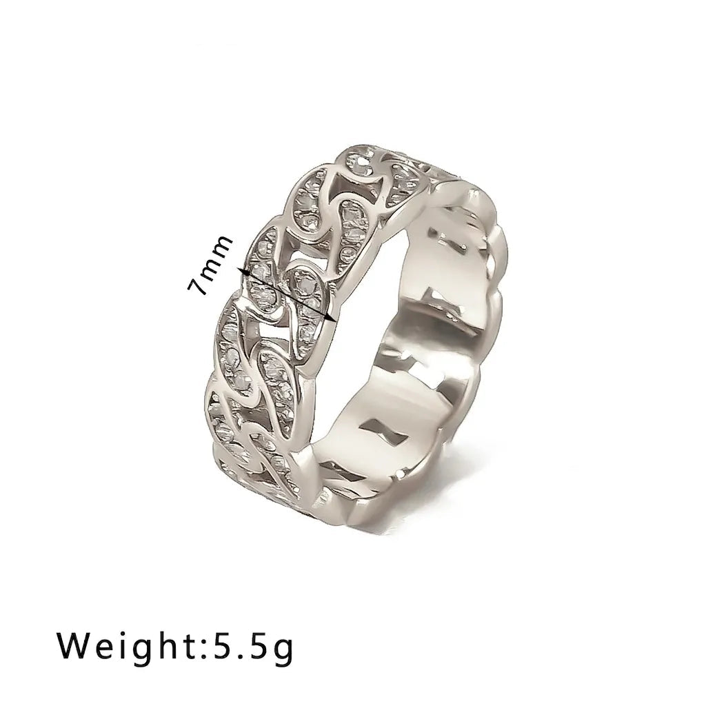 A silver-toned band ring with an intricate openwork filigree pattern set with small clear stones, shown on a white background with text overlays indicating the model 'NB-R24119-S' and weight 'Weight: 5.5g'.