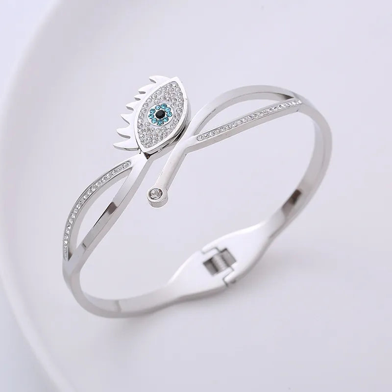 Stainless Steel Evil Eye Spring Bangle - Steel