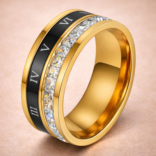 Gold ring with diamond-studded band and Roman numeral inlay on a beige background