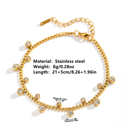 Gold chain anklet with rhinestone accents, shown on a white background with text detailing its material, weight, and length, plus size measurements for the rhinestones.
