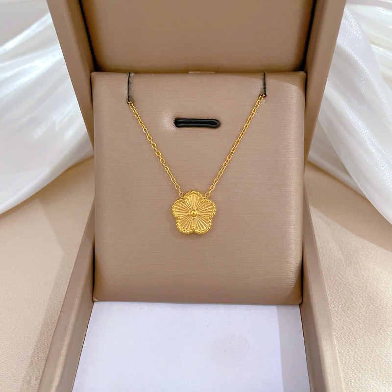 Gold five-petal clover necklace