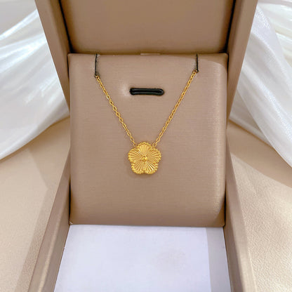 Gold five-petal clover necklace