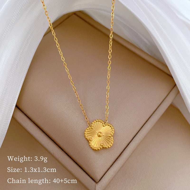 Gold five-petal clover necklace