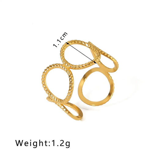 Gold multi-ring stack with textured rope-like edges and smooth circular loops, shown on a white background with text indicating model HF-J1409, 1.1cm width, and 1.