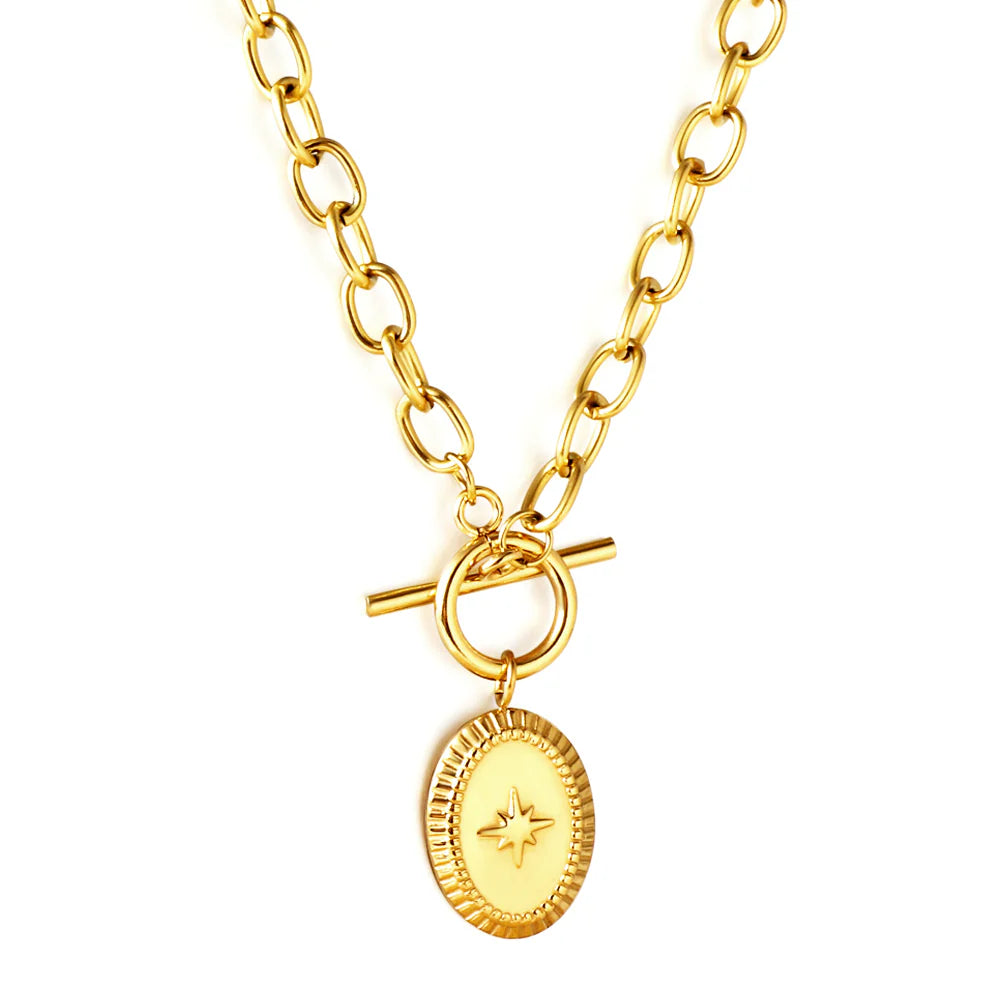 Gold necklace with a pendant on a white background