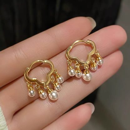 Boucles d'oreilles pendantes Golden Orbit