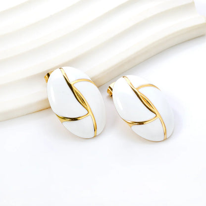 Boucles d'oreilles pendantes noir & ivoire