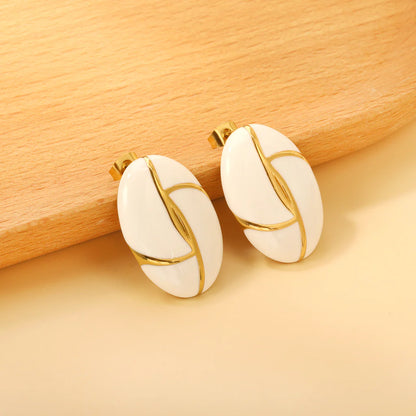 Boucles d'oreilles pendantes noir & ivoire