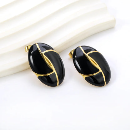 Boucles d'oreilles pendantes noir & ivoire