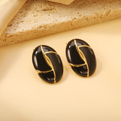 Boucles d'oreilles pendantes noir & ivoire